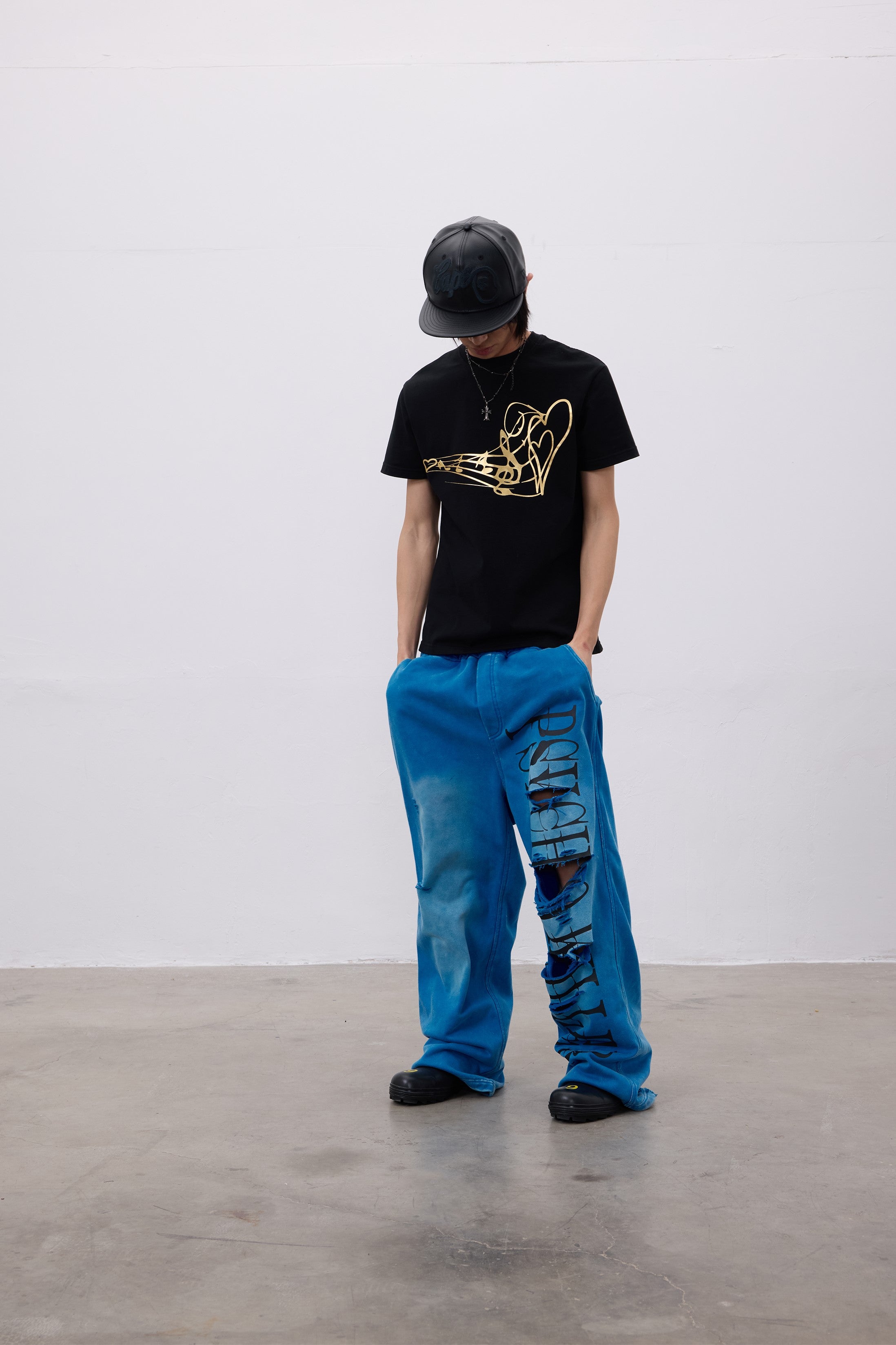 CHAOS GRAPHIC WASHED PANTS