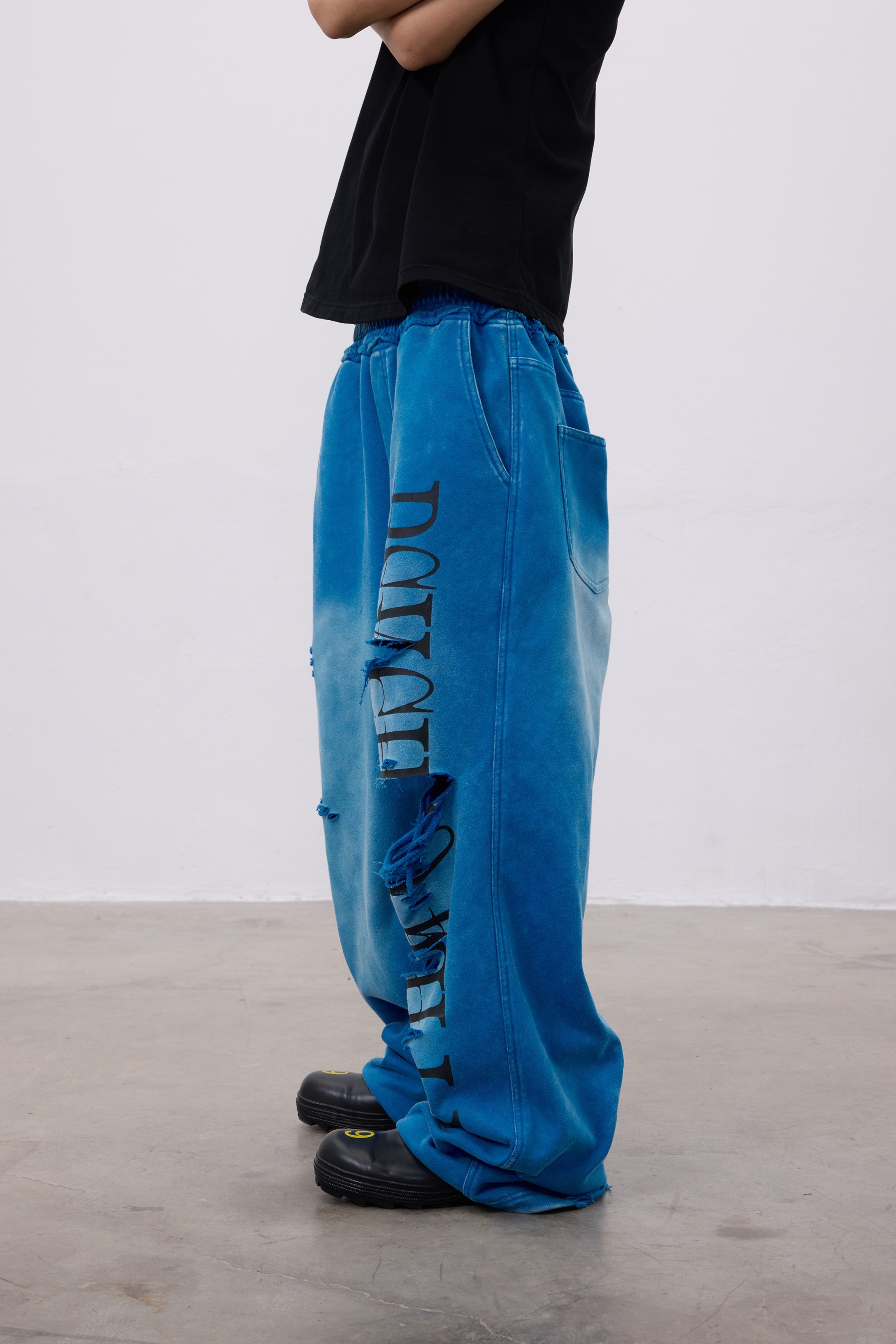 CHAOS GRAPHIC WASHED PANTS