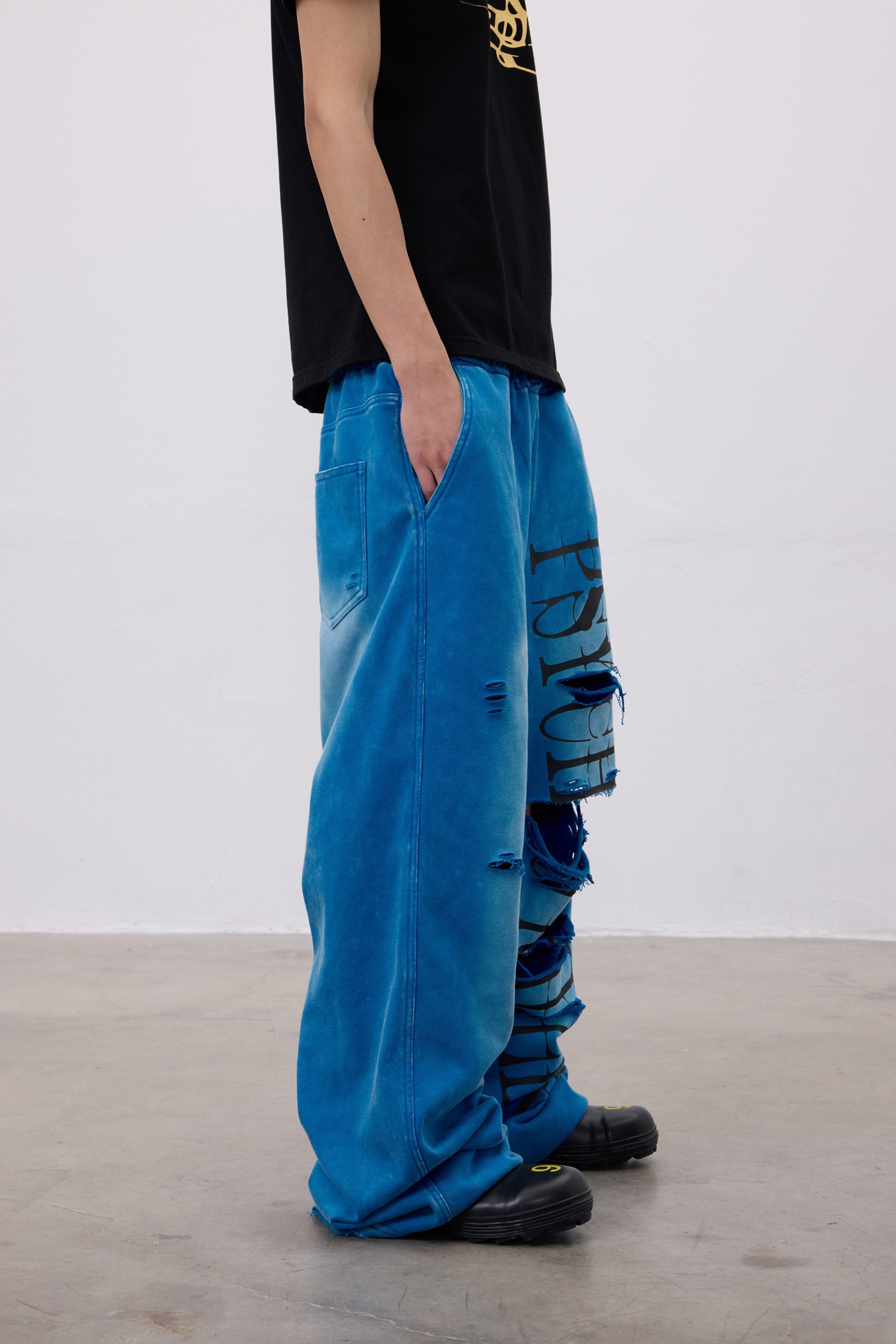 CHAOS GRAPHIC WASHED PANTS