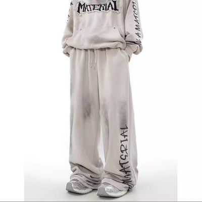 ACID WASHED INITIAL PANTS