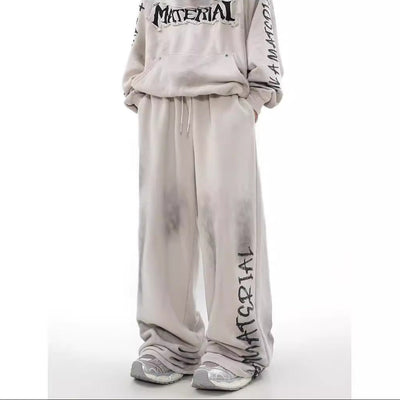 ACID WASHED INITIAL PANTS