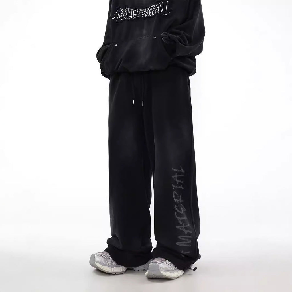 ACID WASHED INITIAL PANTS