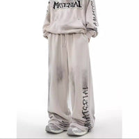 ACID WASHED INITIAL PANTS