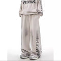 ACID WASHED INITIAL PANTS
